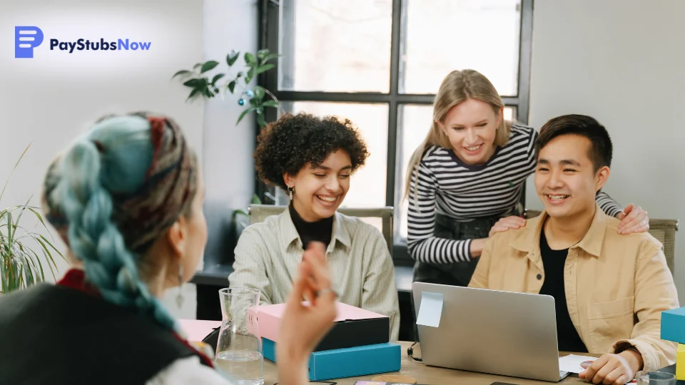 A group of colleagues collaborate in a meeting room.