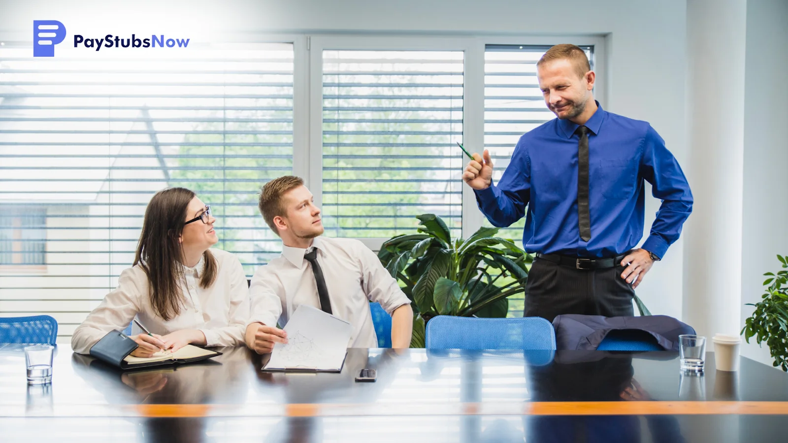 A group of people sitting at a table reviewing paperwork to identify the key differences between an invoice and a receipt.